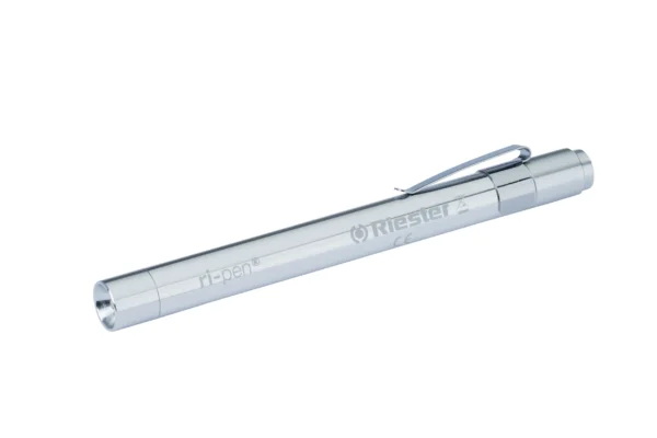 This silver penlight, part of the medic starter pack, features a handy clip and displays the brand "Riester" along with the model name "ri-pen." Ideal as a course add-on for budding medics.